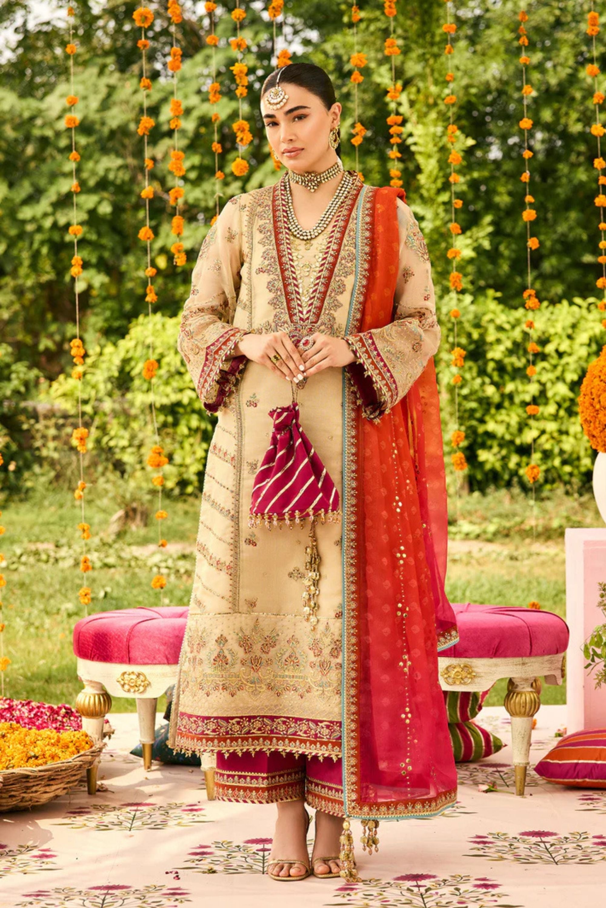 Festive women’s outfit in maroon for wedding party
